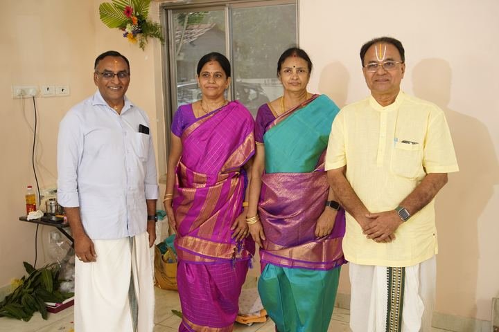 Four family members posing together at the engagement